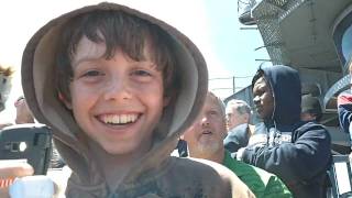 Scout watching an F/A-18 touch and go onboard CVN-77