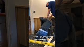 Bathroom vanity install 😍 #TikTokdiy #homerenovation #woodworking #howto #bathroomrenovation #Learn