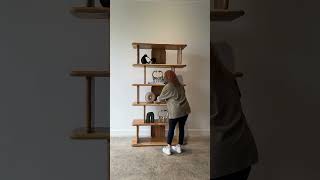 Had to get on our tippy toes to style this 80” high bookshelf