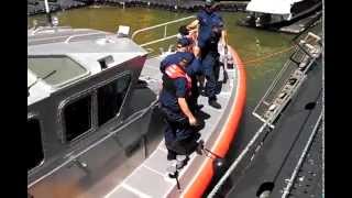 US Coast Guard Boat Along Side the USS COD.  1 of 2. Aug 22, 2015.