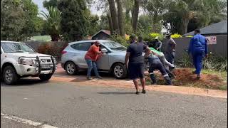 The car stuck in a hole on Oribi Street has finally been pushed out!