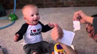 Baby Laughing at Ripping Paper (Falls Backwards)