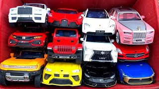 Box Full of Model Cars Rolls-Royce Cullinan, Honda Civic, Porsche Taycan, Nissan GTR, Jeep Car