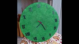 Large green wall clock.