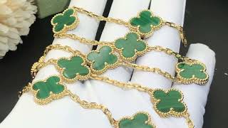 Malachite necklace, 10 motifs, 18k yellow gold