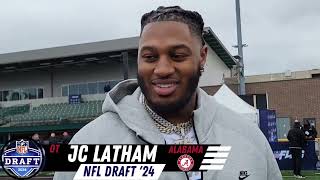 Alabama OT JC Latham talks to media