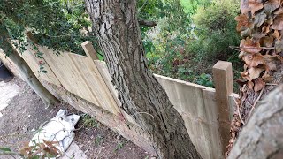 Building a fence on a wall in a difficult place- on the windiest day this year! Will this work?