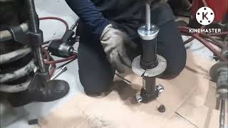 #how to separate coil spring to shock absorber @mechanicven