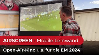 Wie schnell bauen wir die mobile AIRSCREEN Leinwand auf? Für drinnen und draußen geeignet. EM 2024