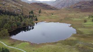 Stunning views of Blea Tarn in the UK Lake district - 4k Drone Footage