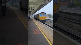 GBRF 66710 " Phil Packer " passing Peterborough