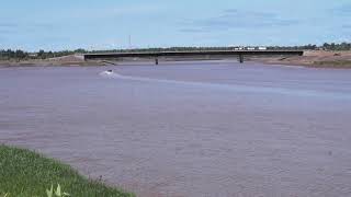 Rescue boat going upriver and passing under new span @ Riverview NB. June 6, 2021.