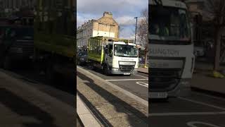 small DAF garbage truck on route back to depot