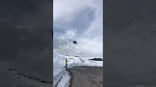 MD500 helicopter landing in the French Alps at Courchevel altiport