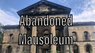 Abandoned mausoleum in the woods