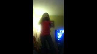 Sister dances and sings to her paper jam