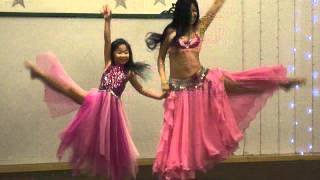 Miss Belly Dance Malaysia Performing Arts Together with A Little Girl