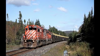 CPKC trains (Pair of CP SD40-2's on a CWR) in October along Lake Superior