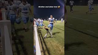 Arizona state football ground, adorable sister vs brother movement.