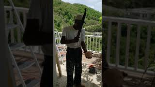 Hercules Fraser July 2019 chops open a coconut