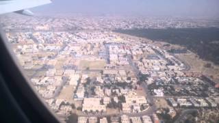 Emirates Landing in Dubai Airport. View from Emirates Flight