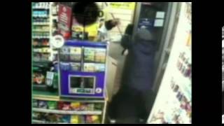 Watch CCTV footage of shopkeeper warding off robber with his own weapon