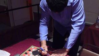 Musician Chubby Checker signing autographs