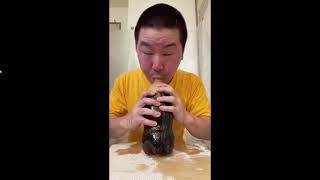 Asian guy drinks Coke with Mentos 😂