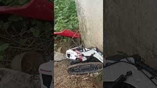 Tractopelle RC pro en action