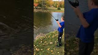 Lucas reeling in a Largemouth! #pondfishing #largemouthbassfishing