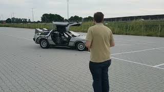 The owner try's his first 'hands on' the custom controller of his Remote controlled BTTF delorean!