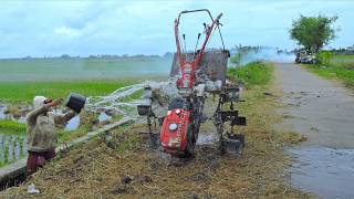 Quick Tiller Tractor Tilling Field   Walking Out Then Washed