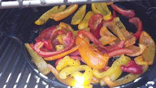 Weber SmokeFire Italian sausages with sweet peppers