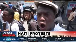 Haitian capital halted as protesters call for president to quit