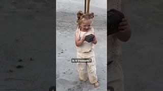 Little girl finds treasure on beach vacation ❤️