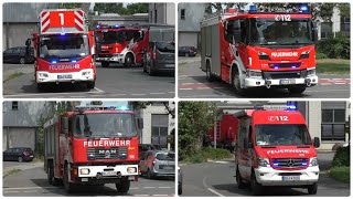 Löschzug der Feuerwehr Duisburg auf Einsatzfahrt