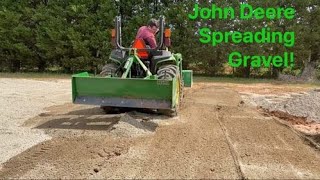 John Deere 3032E Spreading Gravel