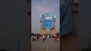 JSW Indian Olympics Jersey flying over India Gate