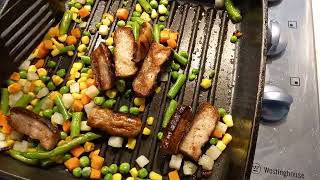 Leftover pork sausages and mixed veggies.