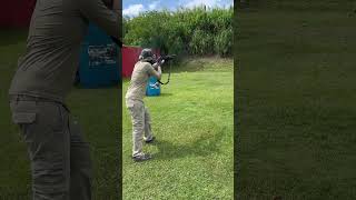 Outside shooting the Benelli M4 12gauge #trending #shotgun