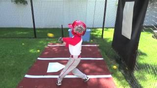 6 year old EJ and the Jugs Jr. Pitching Machine