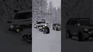 two 4runners from two decades plays in snow