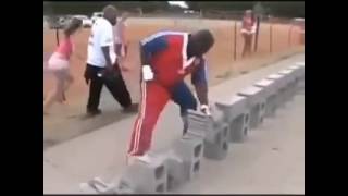 Guy smashes a bunch of bricks in 1 minute