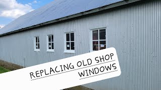 JUST a FEW More to go.  Installing windows in the 1939 shop building.. old/new shop building.