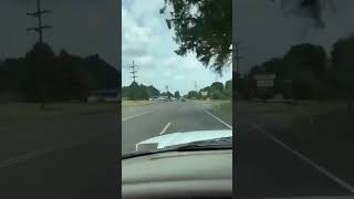 Mustang with parachute on highway