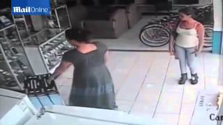 Woman steals TV screen