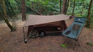 Wildcamping in the rain.  3 of us, and one got very wet.