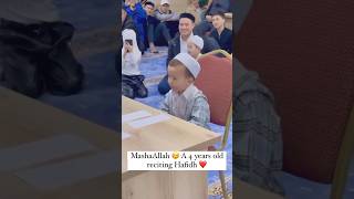 4 year old boy reciting Quran