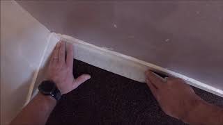 How to apply masking tape between carpet and skirting boards like a pro