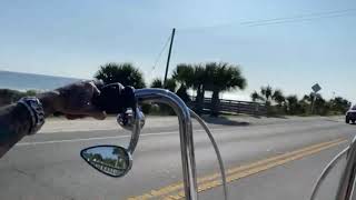 Riding Harley Davidson Wide Glide along amazing coast